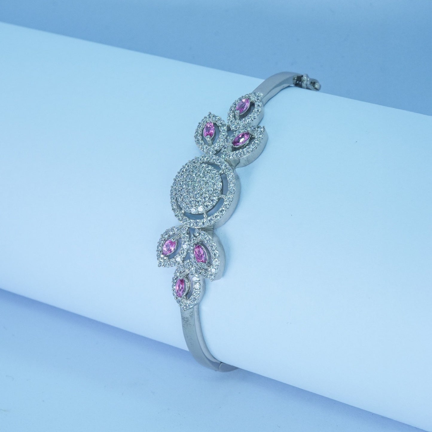 Elegant Floral Silver Bangle with Pink Stones