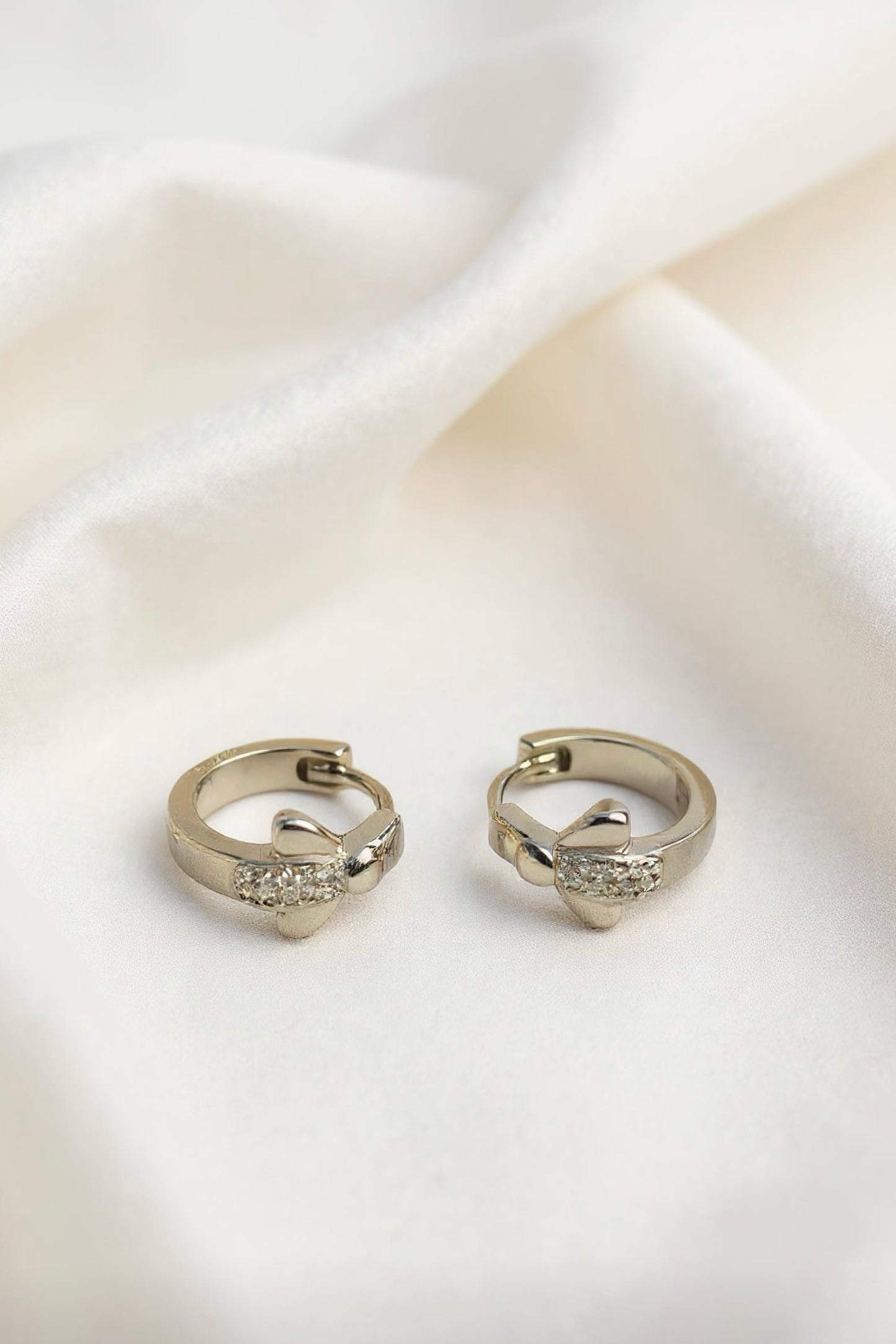 Elegant Silver Knot Huggie Earrings