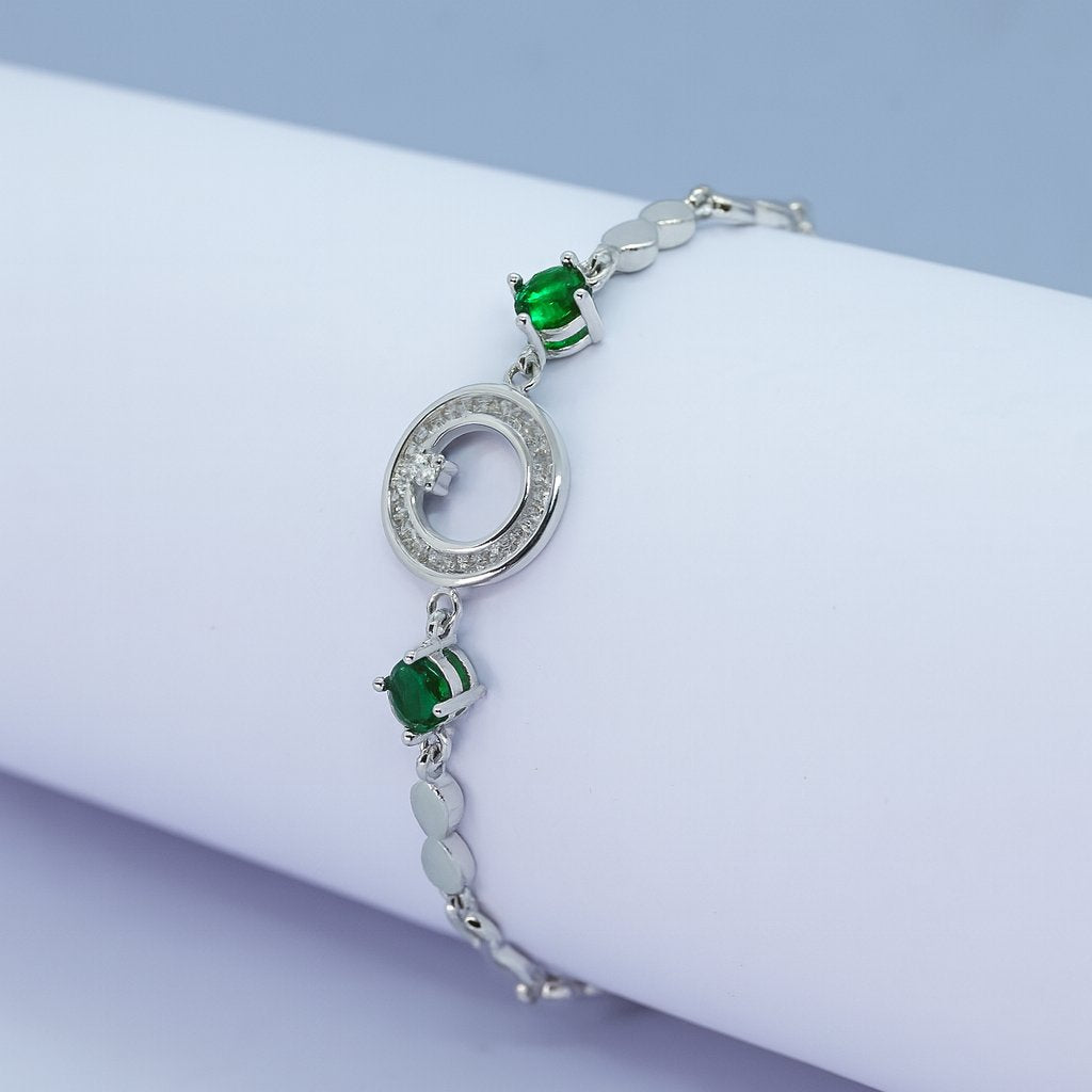 Elegant Silver Bracelet with Green Stones & Circular Crystal Centerpiece