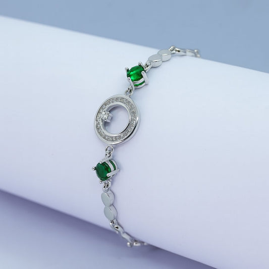 Elegant Silver Bracelet with Green Stones & Circular Crystal Centerpiece